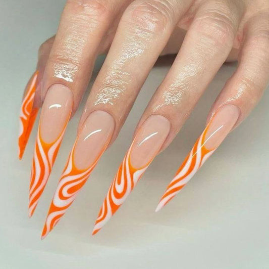 Trendy Orange & White Swirl Stiletto Nails