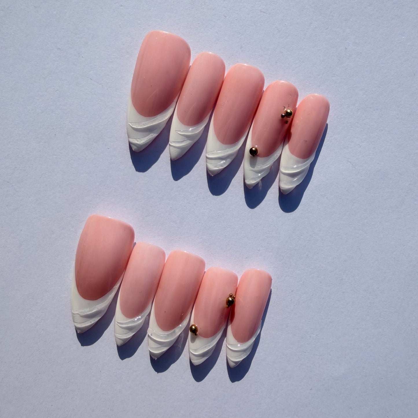 Pink Sculpted French Tip Press-On Nails – 3D White Swirl Tips with Gold Accents
