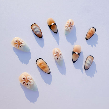 Cream Floral Amber Ombre Press-On Nails – Elegant Almond Tips with 3D Flowers & Black Accents